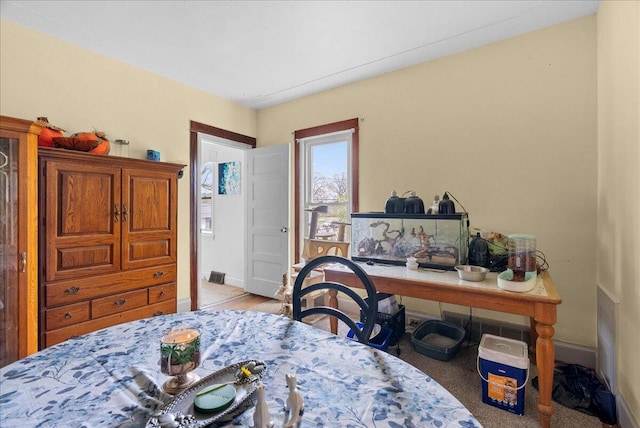 dining room featuring baseboards