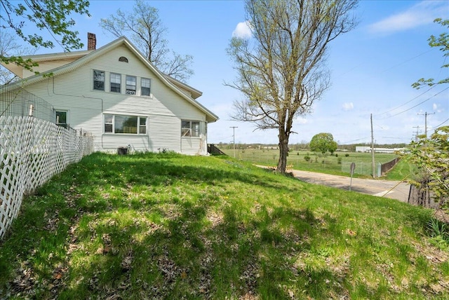 view of yard with fence