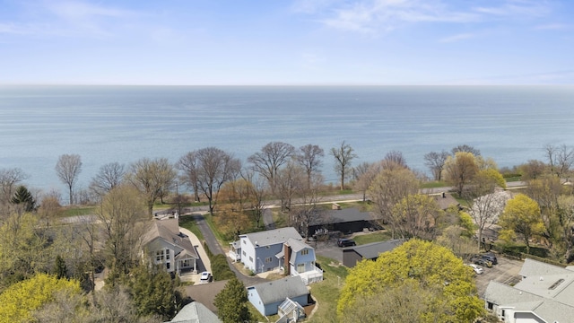 bird's eye view with a water view and a residential view