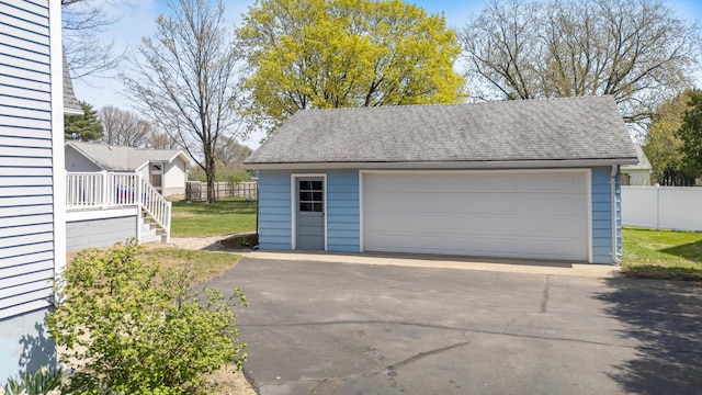 detached garage with fence
