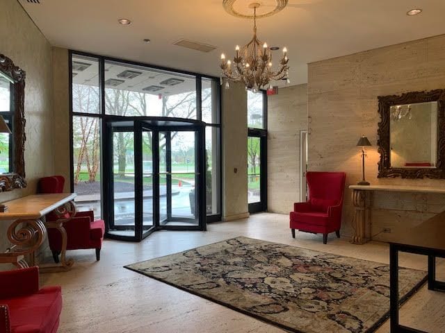 5000 Town Ctr Unit 706, Southfield, MI 48075 - community lobby featuring expansive windows and recessed lighting