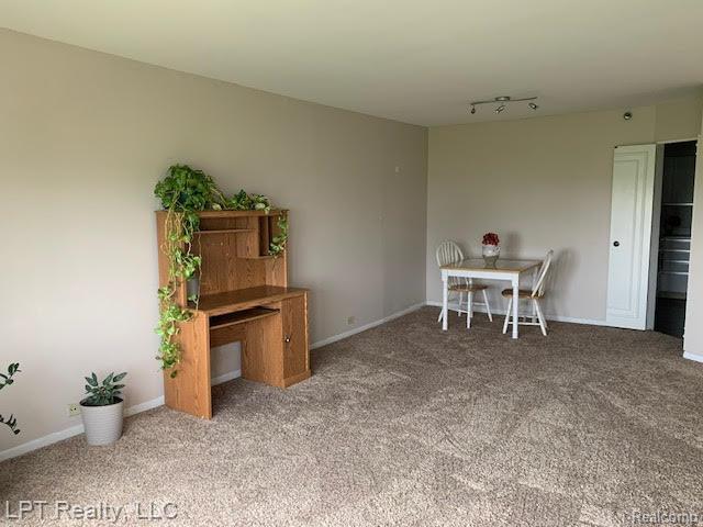 5000 Town Ctr Unit 706, Southfield, MI 48075 - dining room with carpet and baseboards