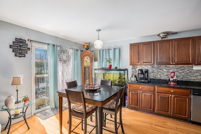 5184 Denwood St, Waterford, MI 48327 - kitchen with decorative light fixtures, backsplash, light wood-type flooring, and dishwasher