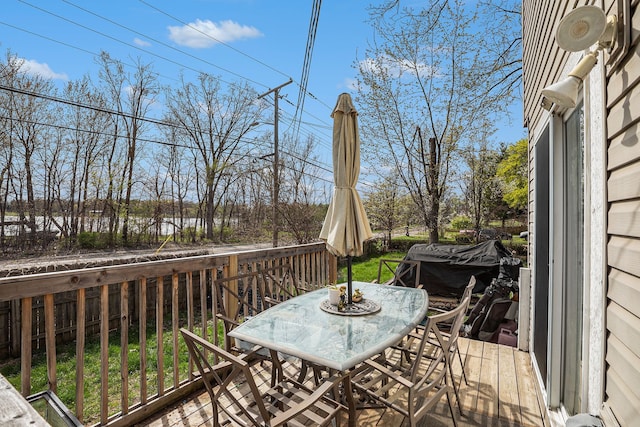 5184 Denwood St, Waterford, MI 48327 - wooden terrace featuring outdoor dining space