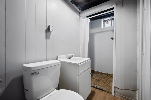 13936 Longacre St, Detroit, MI 48227 - bathroom with vanity, toilet, and wood finished floors