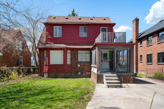 13936 Longacre St, Detroit, MI 48227 - rear view of house featuring a yard, fence, and entry steps