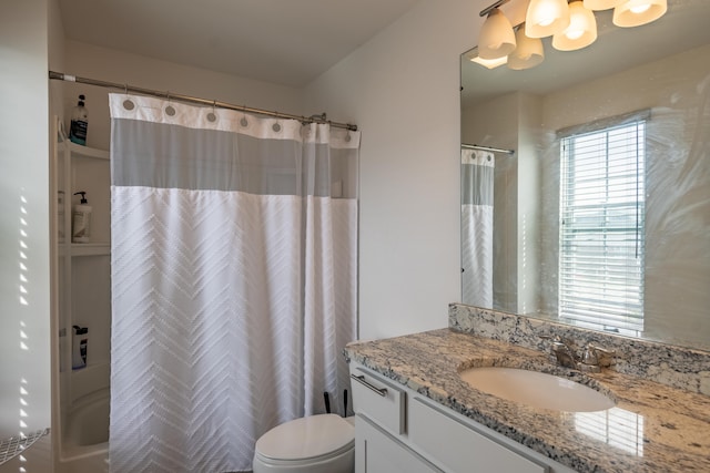 bathroom featuring vanity, a chandelier, toilet, and a shower with curtain