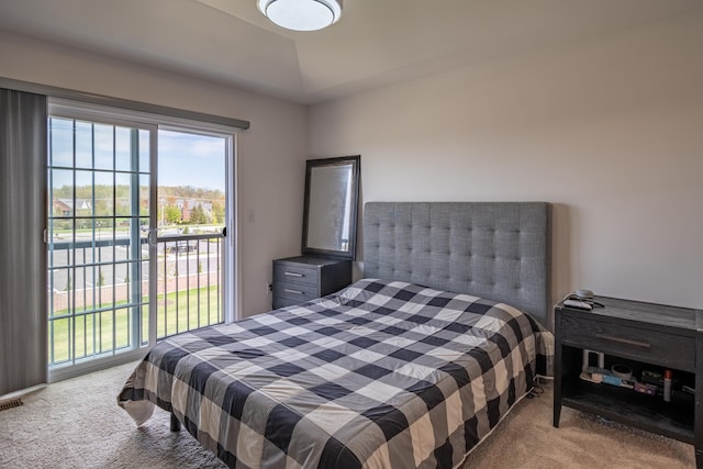 bedroom featuring carpet floors and access to exterior