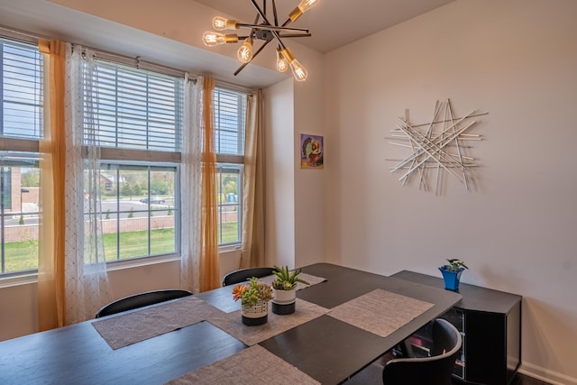 dining area featuring a chandelier