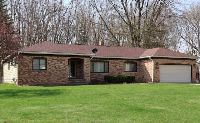ranch-style home with a garage, a chimney, a front lawn, and brick siding