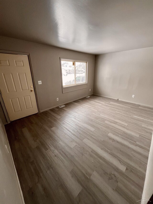 3704 Huntley St, Saginaw, MI 48601 - interior space with baseboards and wood finished floors