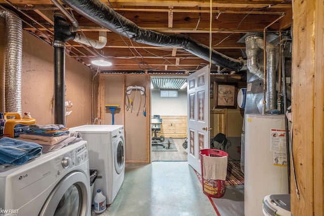 unfinished basement featuring washing machine and clothes dryer and gas water heater