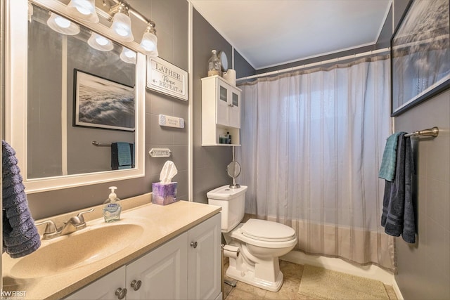 bathroom featuring vanity, tile patterned floors, toilet, and a shower with shower curtain