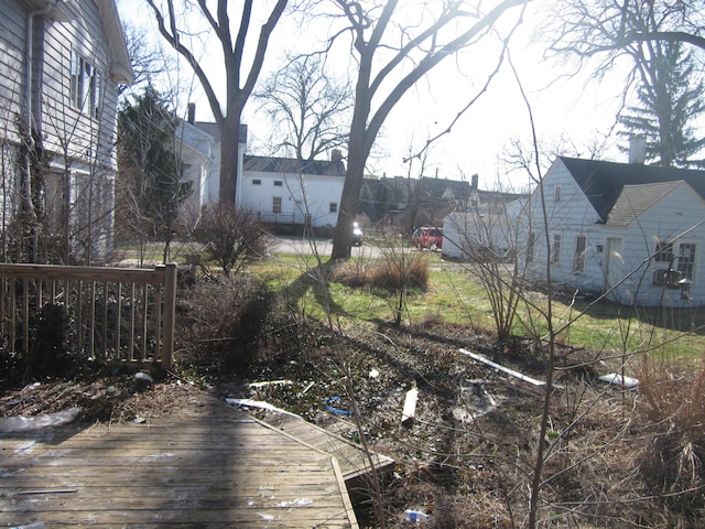 view of yard with a wooden deck