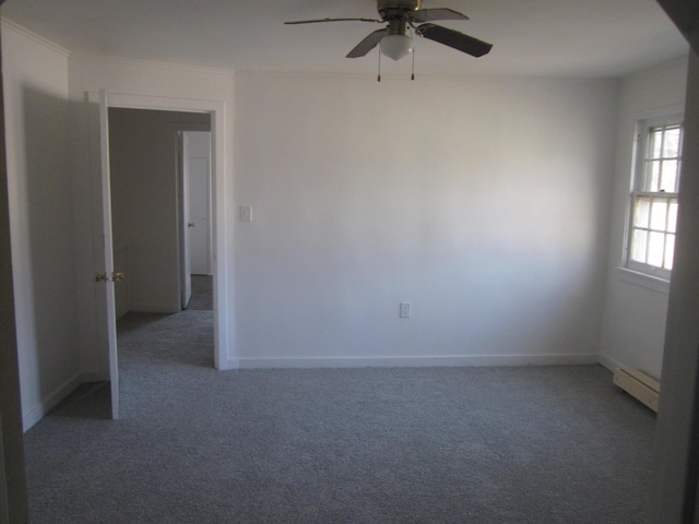 empty room with baseboards, a ceiling fan, carpet, and baseboard heating