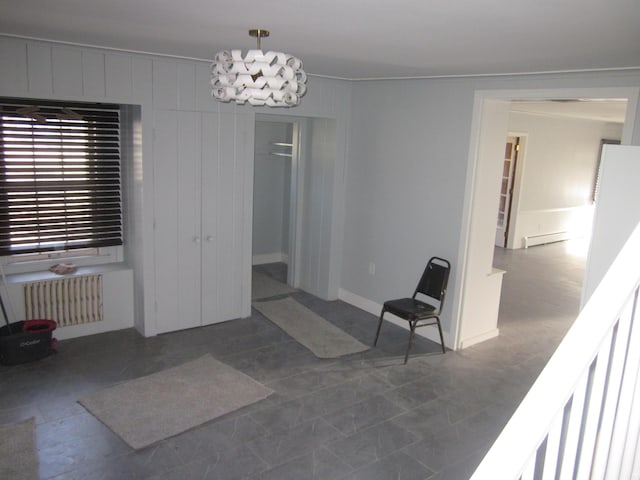 interior space featuring radiator heating unit and baseboard heating