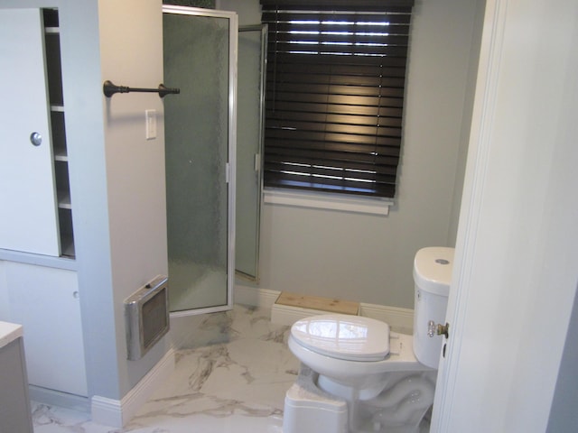 full bath with baseboards, a shower stall, toilet, and marble finish floor
