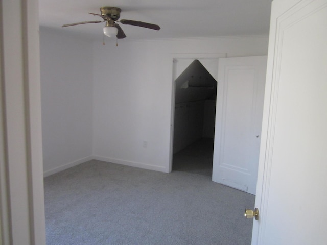 interior space featuring carpet floors and a ceiling fan