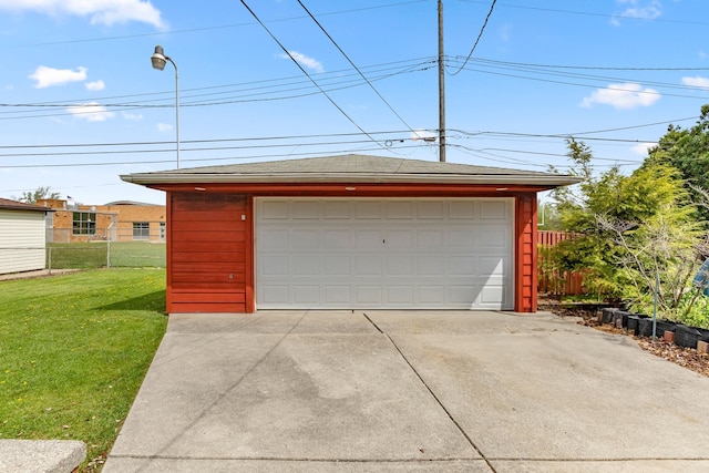 detached garage with fence