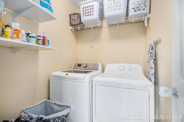 laundry area featuring laundry area and washer and dryer