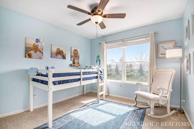 bedroom with carpet flooring, baseboards, and ceiling fan