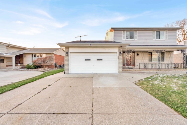 traditional-style home with an attached garage, a porch, driveway, and brick siding