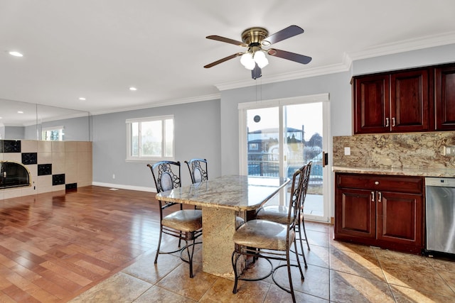 dining area featuring a ceiling fan, baseboards, recessed lighting, and ornamental molding