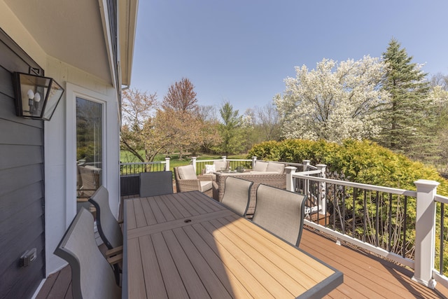 3941 Steamboat Ct, Ann Arbor, MI 48108 - wooden terrace featuring an outdoor hangout area and outdoor dining space
