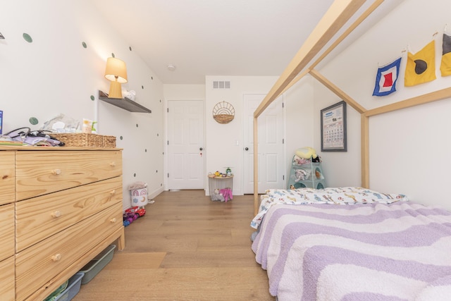 3941 Steamboat Ct, Ann Arbor, MI 48108 - bedroom featuring visible vents and light wood-type flooring
