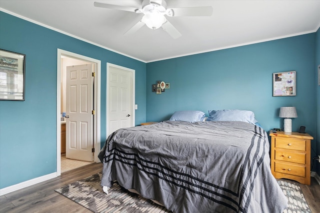 bedroom featuring baseboards, ornamental molding, ceiling fan, and wood finished floors