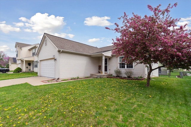 single story home featuring fence, an attached garage, driveway, and a front yard