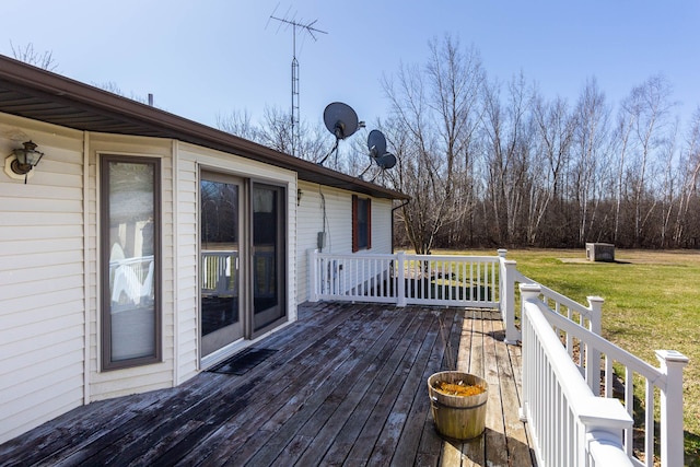 wooden deck with a yard