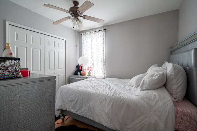 bedroom featuring a closet and a ceiling fan