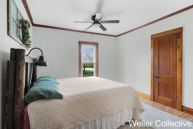 bedroom with baseboards, ornamental molding, light wood finished floors, and ceiling fan