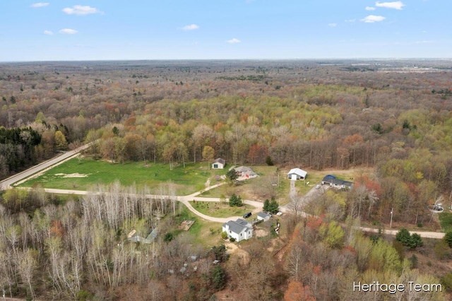 bird's eye view featuring a forest view