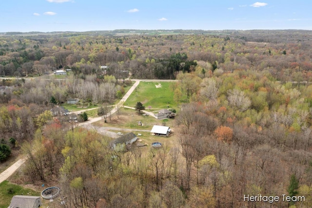 drone / aerial view with a view of trees