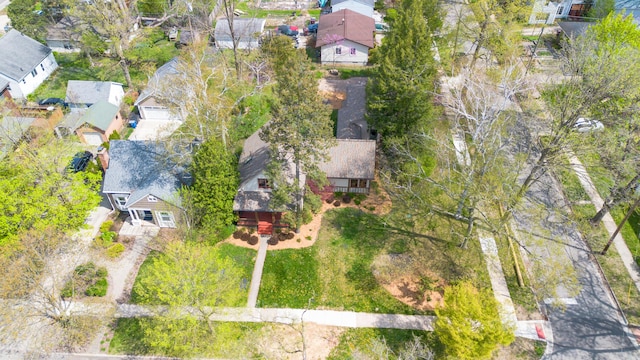 birds eye view of property with a residential view
