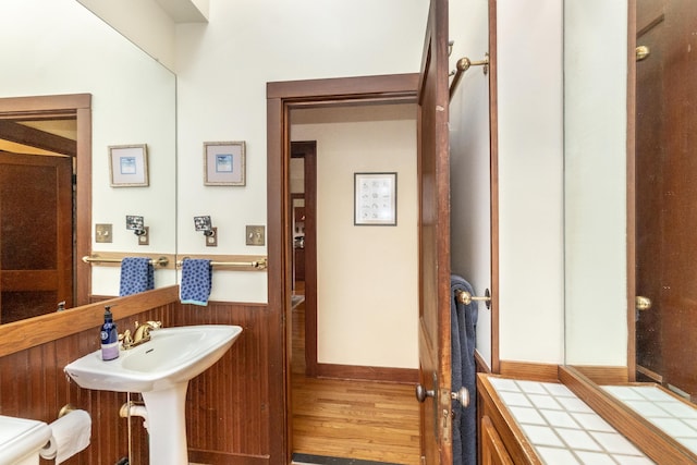 bathroom featuring wood finished floors