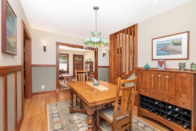 dining area with light wood-style flooring