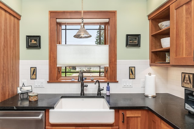 kitchen with brown cabinets, open shelves, a sink, dishwasher, and tasteful backsplash