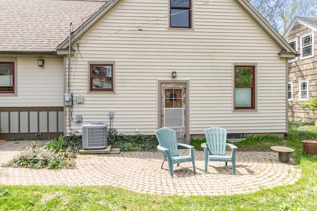 back of house featuring a patio and central AC