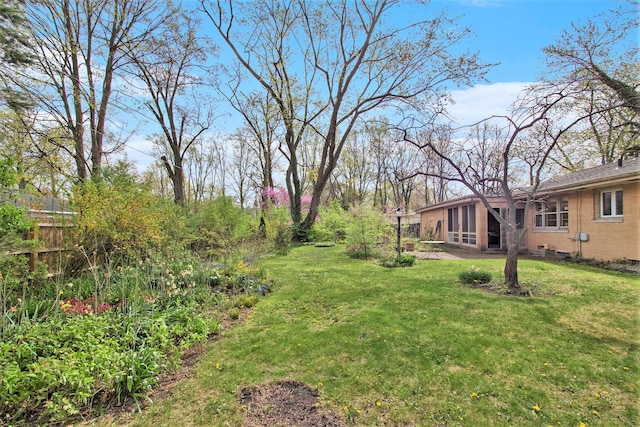 view of yard featuring fence