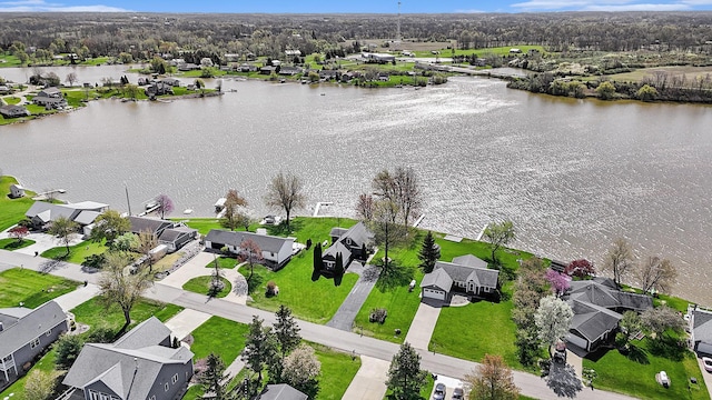 aerial view featuring a water view and a residential view