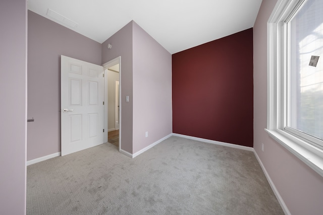 1989 Gladstone St, Detroit, MI 48206 - unfurnished bedroom featuring carpet flooring, baseboards, and visible vents