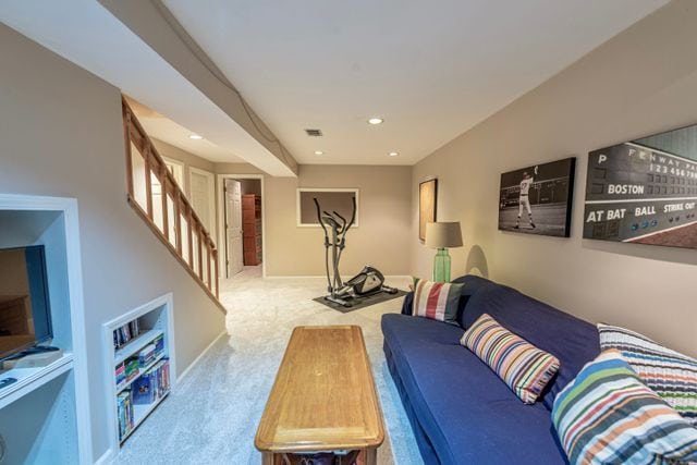 living room with visible vents, stairs, baseboards, recessed lighting, and carpet flooring