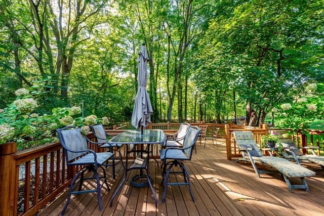 wooden deck with outdoor dining space