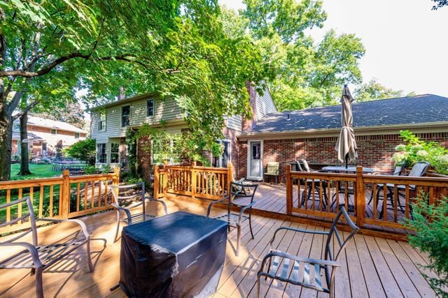 wooden deck with outdoor dining space