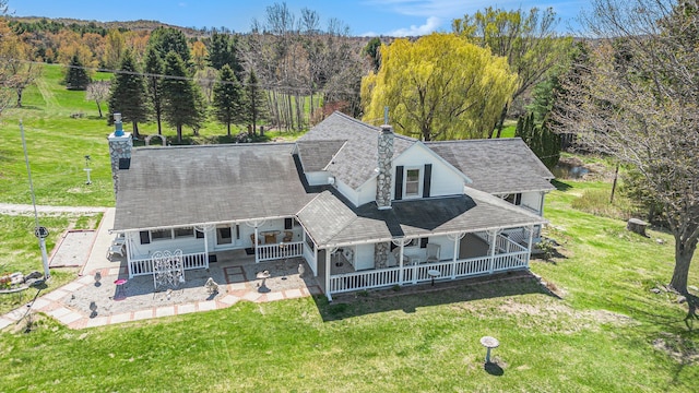 3121 Grace Rd, Frankfort, MI 49635 - aerial view of property and surrounding area featuring a forest