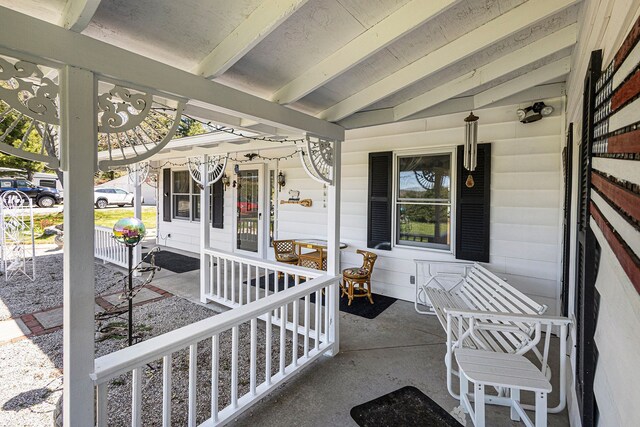3121 Grace Rd, Frankfort, MI 49635 - view of patio featuring a porch