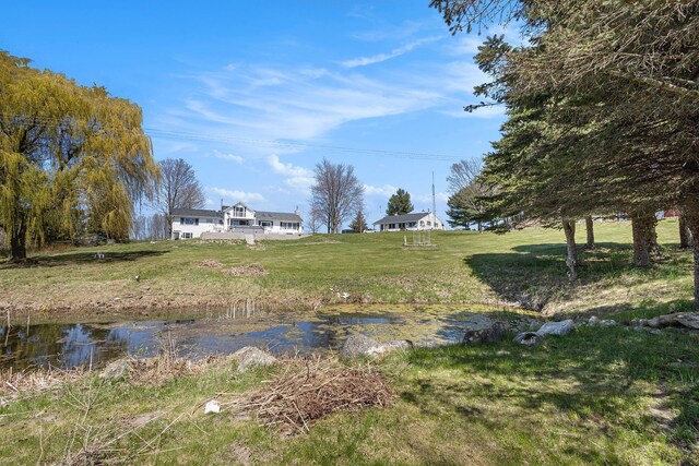 3121 Grace Rd, Frankfort, MI 49635 - view of yard with a water view